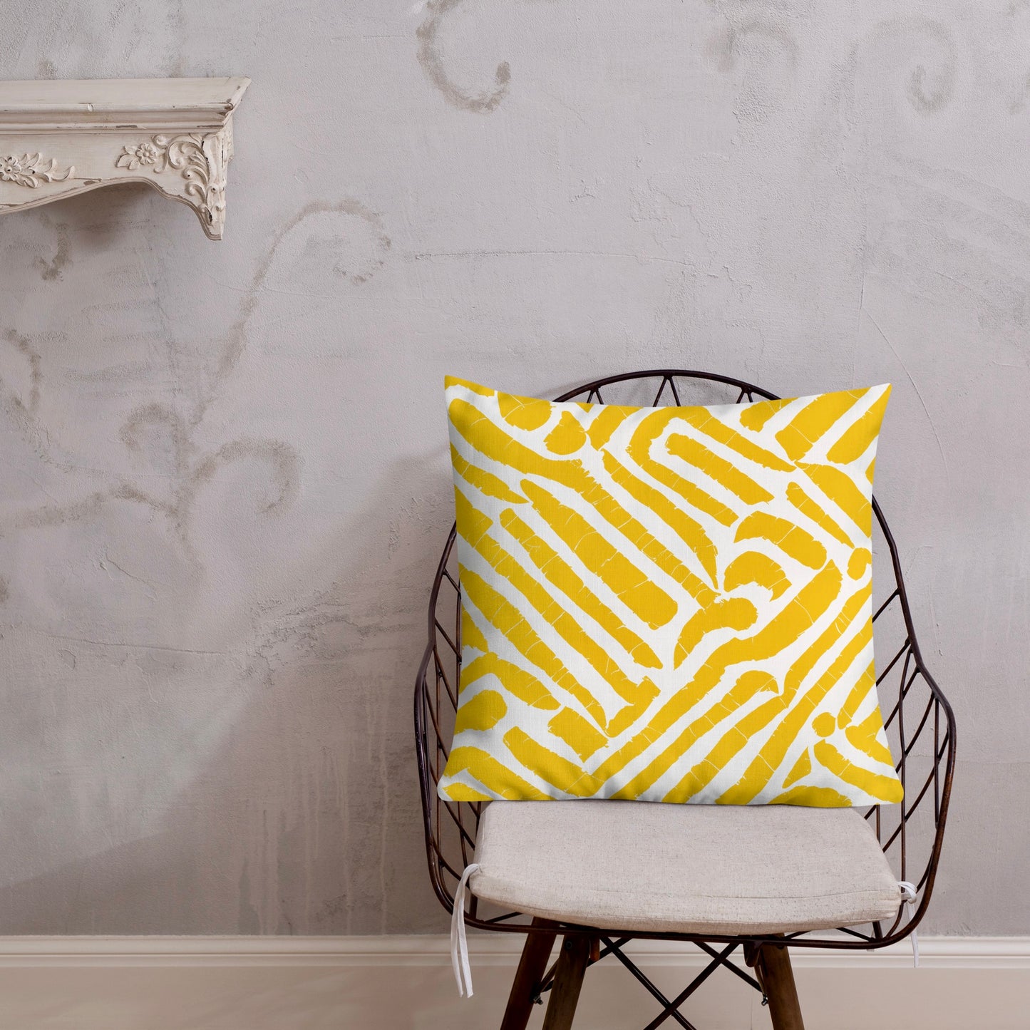 22x22 ChiChi yellow throw pillow from Tintin Studios, extensive and vibrantly patterned.