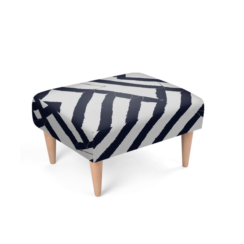 Blue Lokoja Artigianale footstool from Tintin Studios, featuring intricate geometric patterns in a soothing blue hue, perfectly staged against a minimalist background to highlight its elegant design.