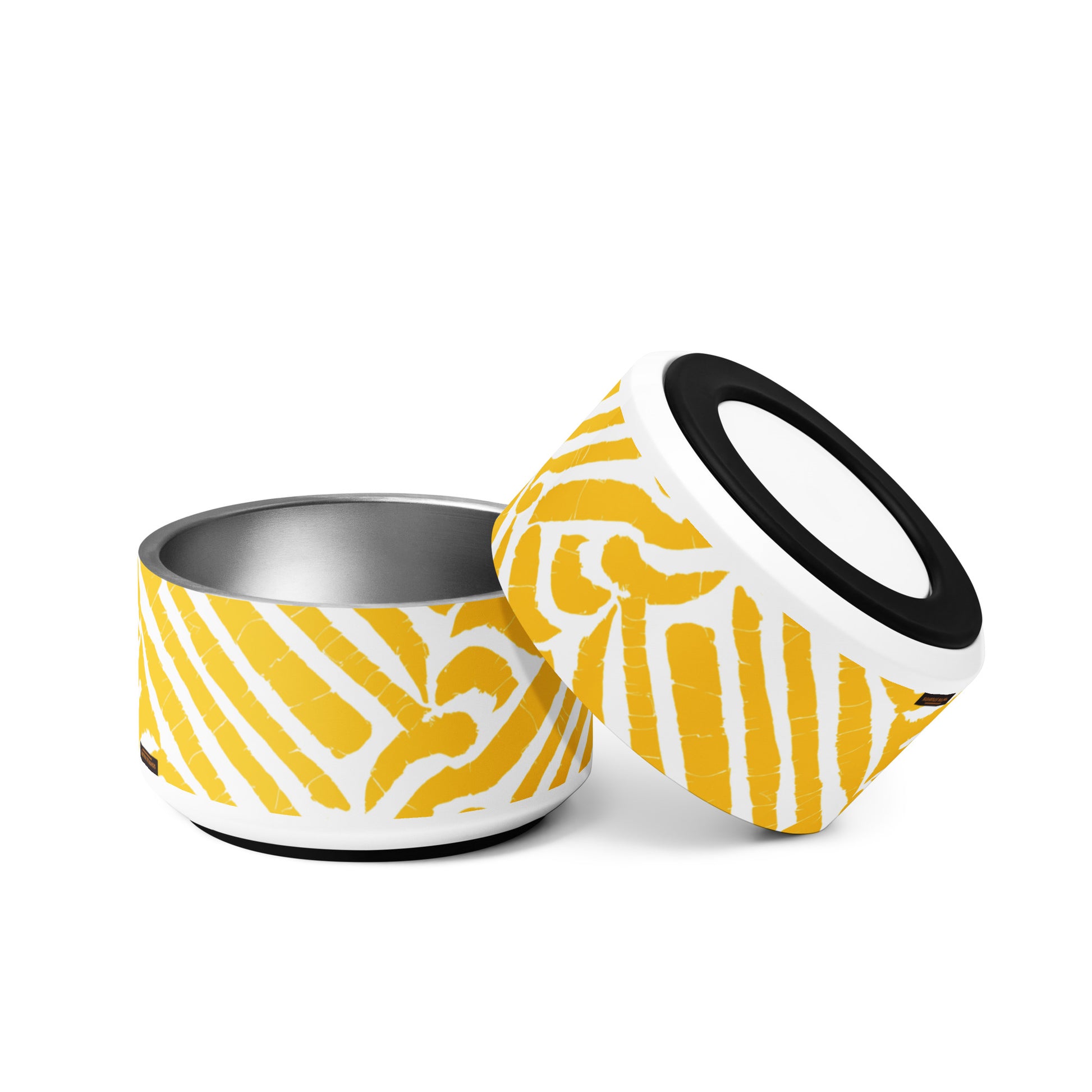 Detailed image of the non-slip rubber base on a yellow Lagos pet bowl by Tintin Studios, highlighting its functional design. The base ensures the bowl stays in place, providing a safe and secure feeding experience for pets